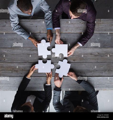 Diverse Team People Assembling Jigsaw Puzzle Multiracial Group Of