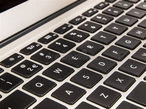 Detail of a QWERTY Laptop Keyboard Stock Image - Image of energy, light ...