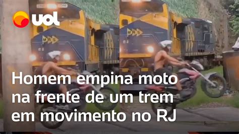 Homem Empina Moto Na Frente De Um Trem Em Movimento E Quase