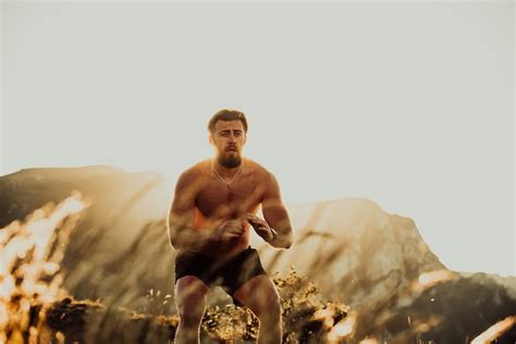 Premium Photo | An athlete doing conditioning training on top of a ...