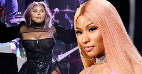 Fans Think Nicki Minaj Has Secretly Squashed Her Feud With Lil Kim ...