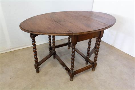 Antique English Oak Drop Leaf And Barley Twist Gateleg Table With Oval