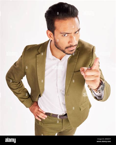 Portrait, blame and scolding with a business man in studio on a white ...