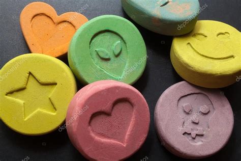 Ecstasy Pills Or Tablets Drugs — Stock Photo © Portokalis 98597454