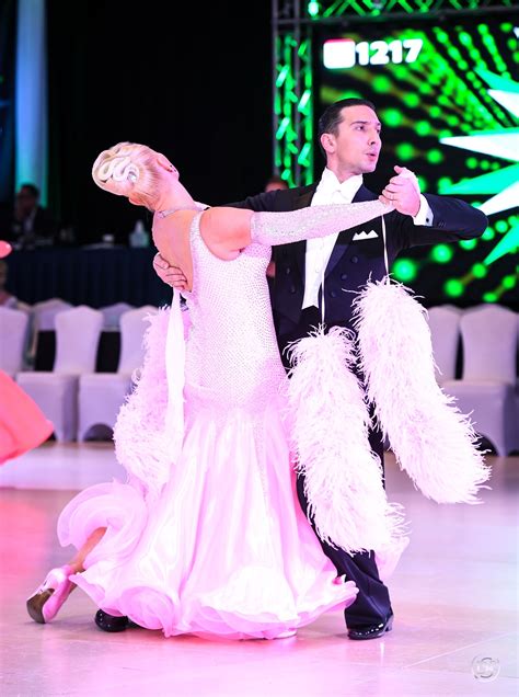 A Man And Woman Dancing On A Dance Floor