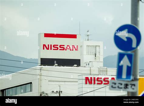 Nissan Logo Sign On A Nissan Car Dealer Building Stock Photo Alamy