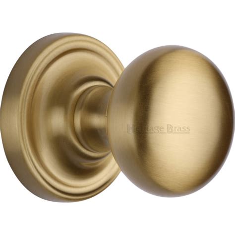 Modern Bun Mortice Door Knobs On Rose In Satin Brass From Cheshire Hardware Door Handles