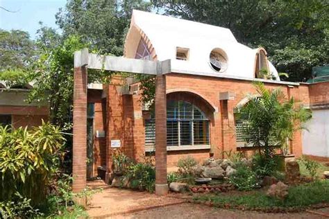 Auroville Earth Institute | Beautiful modern homes, Rammed earth wall ...