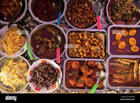 Typical Burmese food at a lunch stall in Yangon, Myanmar Stock Photo - Alamy