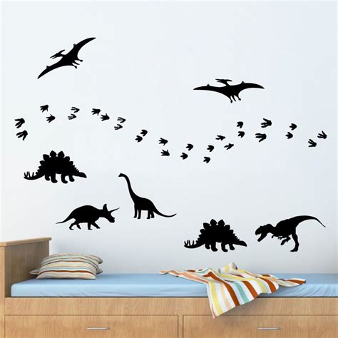 The Dinosaurs Are Flying Away From Each Other In This Wall Decal Set