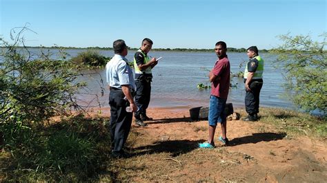 Canoa Volcó En Aguas Del Río Paraguay Y Dos Pescadores Permanecen