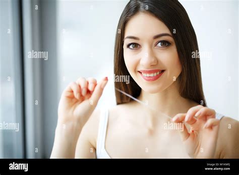 Teeth Care Beautiful Smiling Woman Flossing Healthy White Teeth High