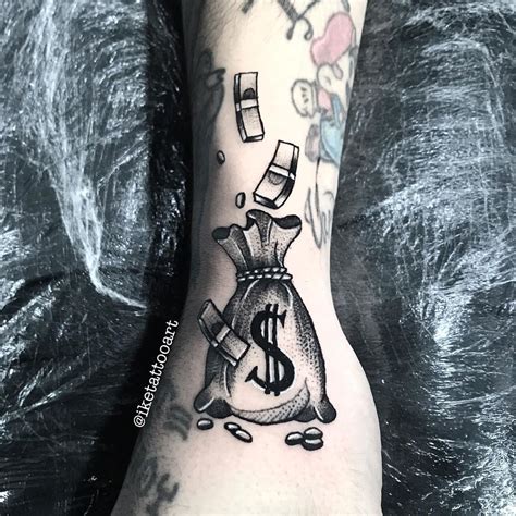 A Person With A Tattoo On Their Arm Has A Money Bag And Dollar Signs