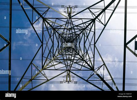 Power Or Electricity Lines Crossing The Countryside On Pylons Used To