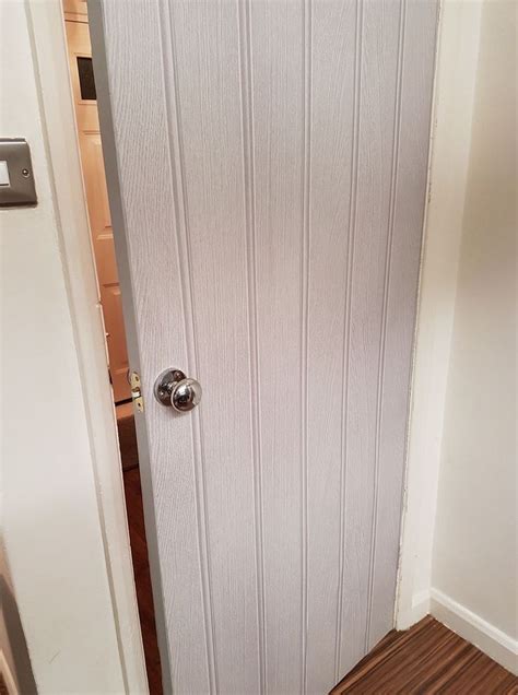 Door Wrapped In Arthouse Tongue And Groove Wood Panel 3d Effect Wall