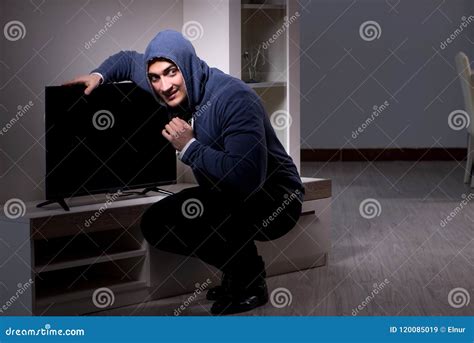 The Burglar Thief Stealing Tv From Apartment House Stock Image Image