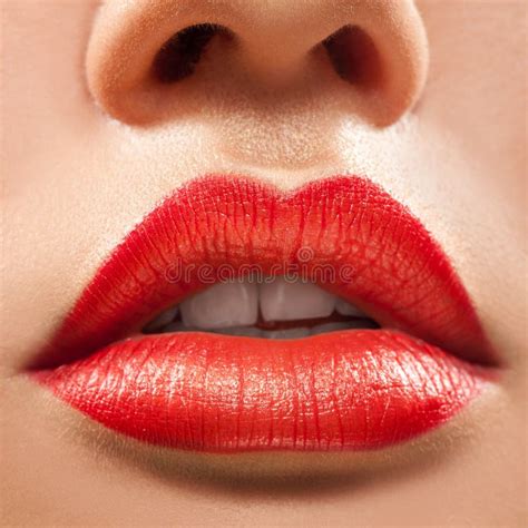 Macro Photo Of Beautiful Woman Lips With Red Lipstick Stock Photo