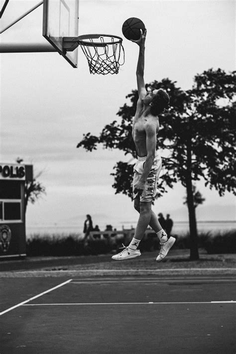 Woman Lying on Basketball Free Throw Line · Free Stock Photo