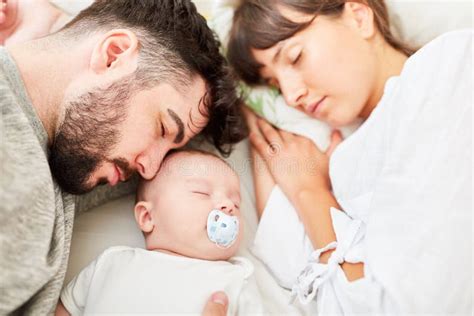 Mom And Son Cuddle Together On A Blanket Stock Image Image Of