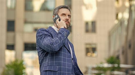 Adult Businessman Having Phone Call In The Street Businessman Call On