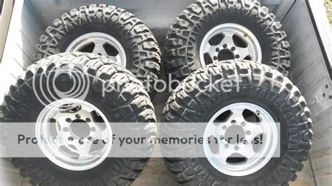 37x1250x16 Maxxis Creepy Crawlers On 16x8 Aluminum 8 Lug Wheels