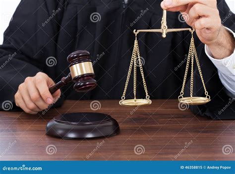 Judge Holding Mallet Royalty-Free Stock Photography | CartoonDealer.com #43870067