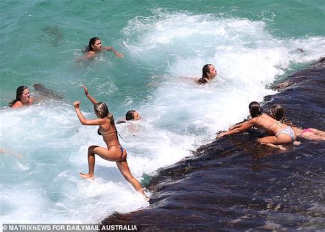 Sydneysiders Flock To Bondi Beach In Their Thousands To Cool Off During