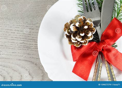 Christmas Dinner Plate And Cutlery Christmas Table Setting Stock Photo