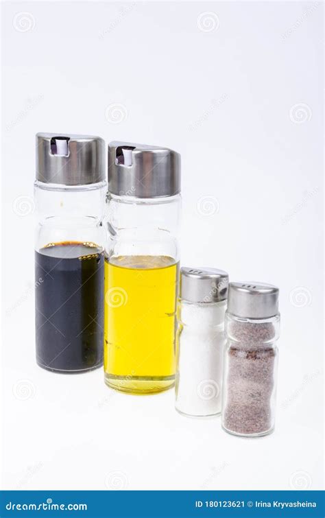 Set Of Glass Bottles With Olive Oil Vinegar Salt And Pepper For Table