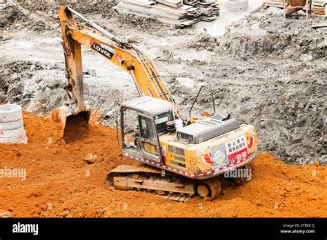 Excavator Digging Soil Inside Construction Site Stock Photo Alamy