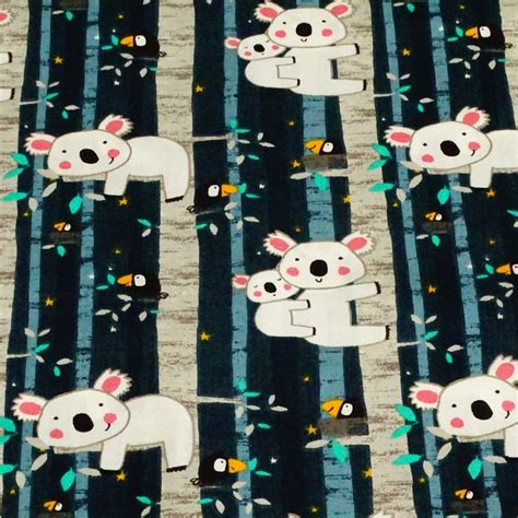 TISSU JERSEY DE COTON IMPRIME KOALA ET SON PETIT VENDU AU DEMI METRE