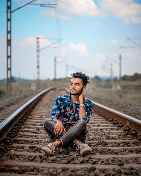 Boy posing on railway track - PixaHive