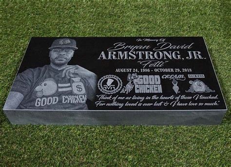 Bronze Grave Marker On Black Granite Slab