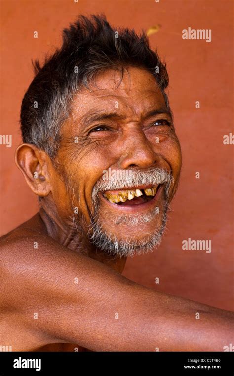 An Indian man laughing Stock Photo - Alamy