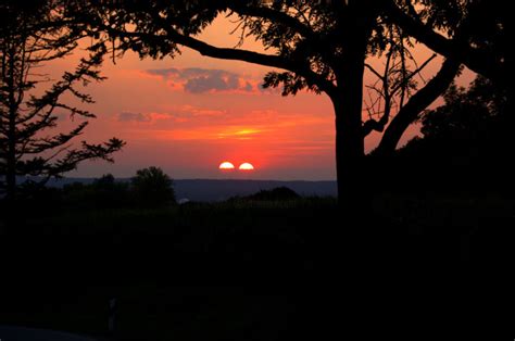 Two Suns In The Sunset Photography By Dirk Dahlmann Artmajeur