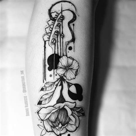 ”30 Inspiring Guitar Tattoo Designs for Music Enthusiasts” – News0days