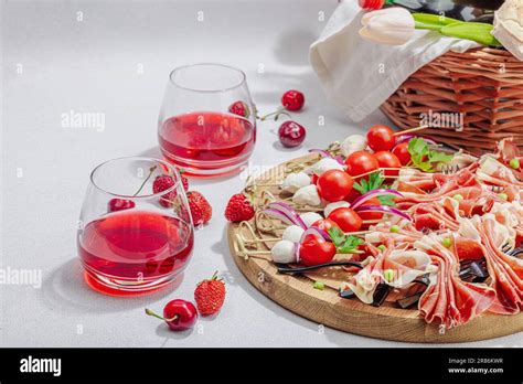 Picnic Food Concept Basket With Wine And Baguette Set Of Snacks On