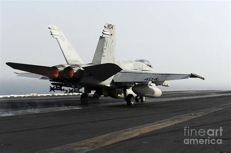 An Fa 18c Hornet Launches Photograph By Stocktrek Images