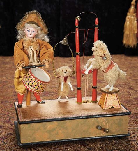 An Old Fashion Doll Is Playing With Two Poodles And A Toy Drum Set