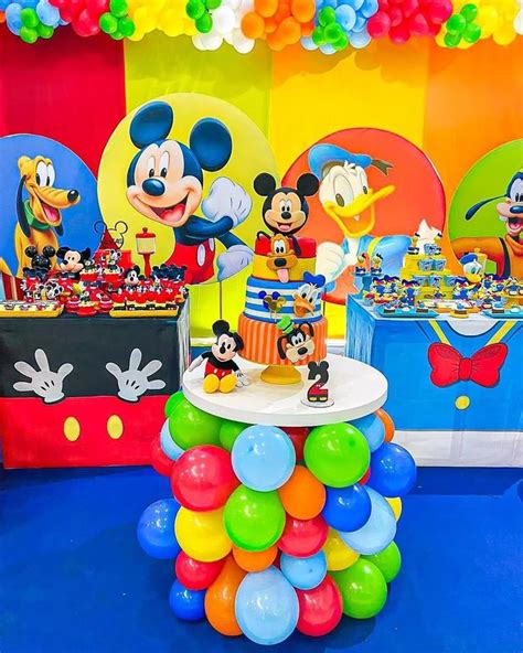 A Mickey Mouse Themed Birthday Party With Balloons