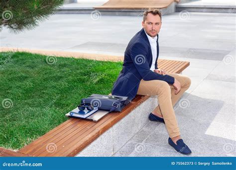 Businessman Sitting On Bench Stock Image Image Of Concentration