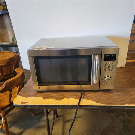 Lot # 15 - General Electric Stainless Steel Microwave - NorCal Online ...