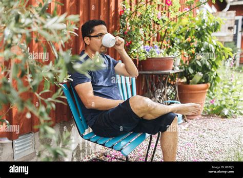 People Drinking Coffee Sitting Outside Hi Res Stock Photography And