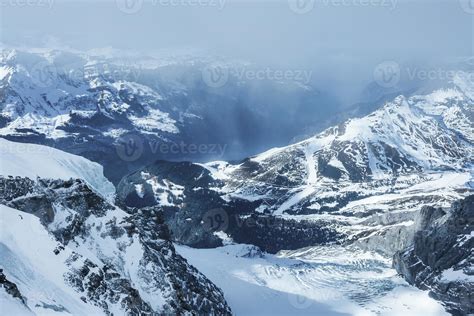 Magica view of the Alps mountains in Switzerland. View from helicopter ...