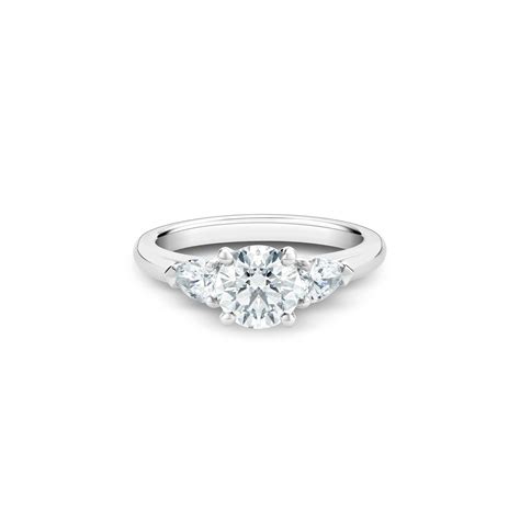 DB Classic Round Brilliant and Pear-Shaped Diamond Ring | De Beers US