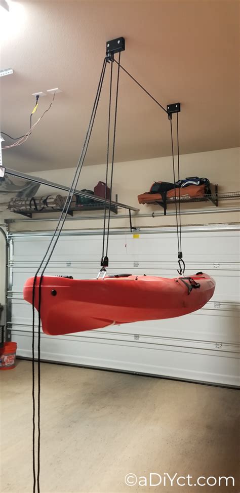 Kayak Hoist Diy How To Make A Diy Garage Ceiling Pulley Lift System For A Thule Ski Cargo Box