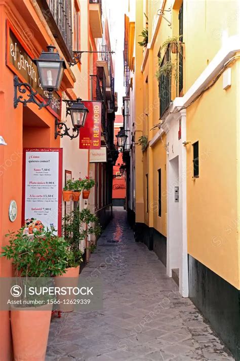 Typical Narrow Street In Seville Spain Superstock