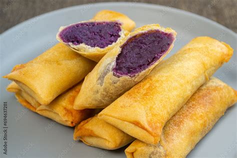lumpia ubi ungu   snack   purple sweet potato cooked