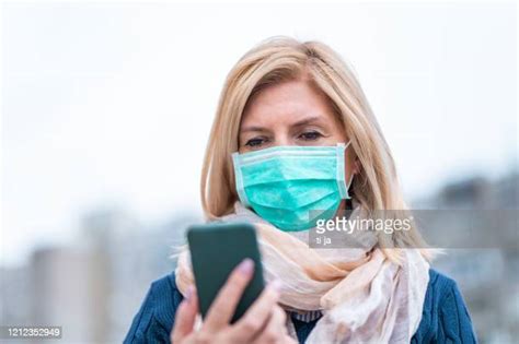 Blonde Woman Wearing Surgical Mask Photos And Premium High Res Pictures