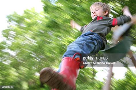 25 Kid Jumping Off Swing Stock Photos, High-Res Pictures, and Images ...